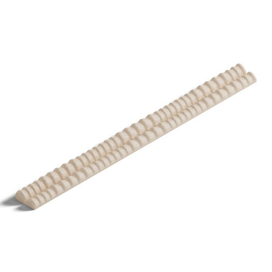 Ripple molding #234-11 in raw hard maple, 6 inch length, isometric view from the sight edge