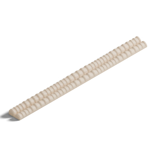 Ripple molding #234-11 in raw hard maple, 6 inch length, isometric view from the sight edge